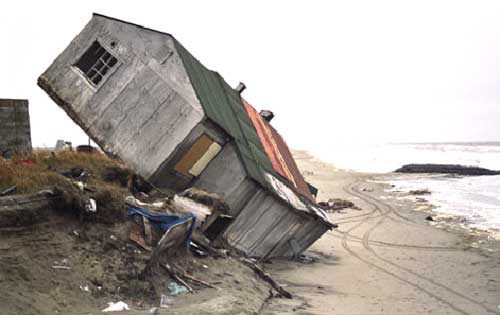 House toppling due to coastal erosion